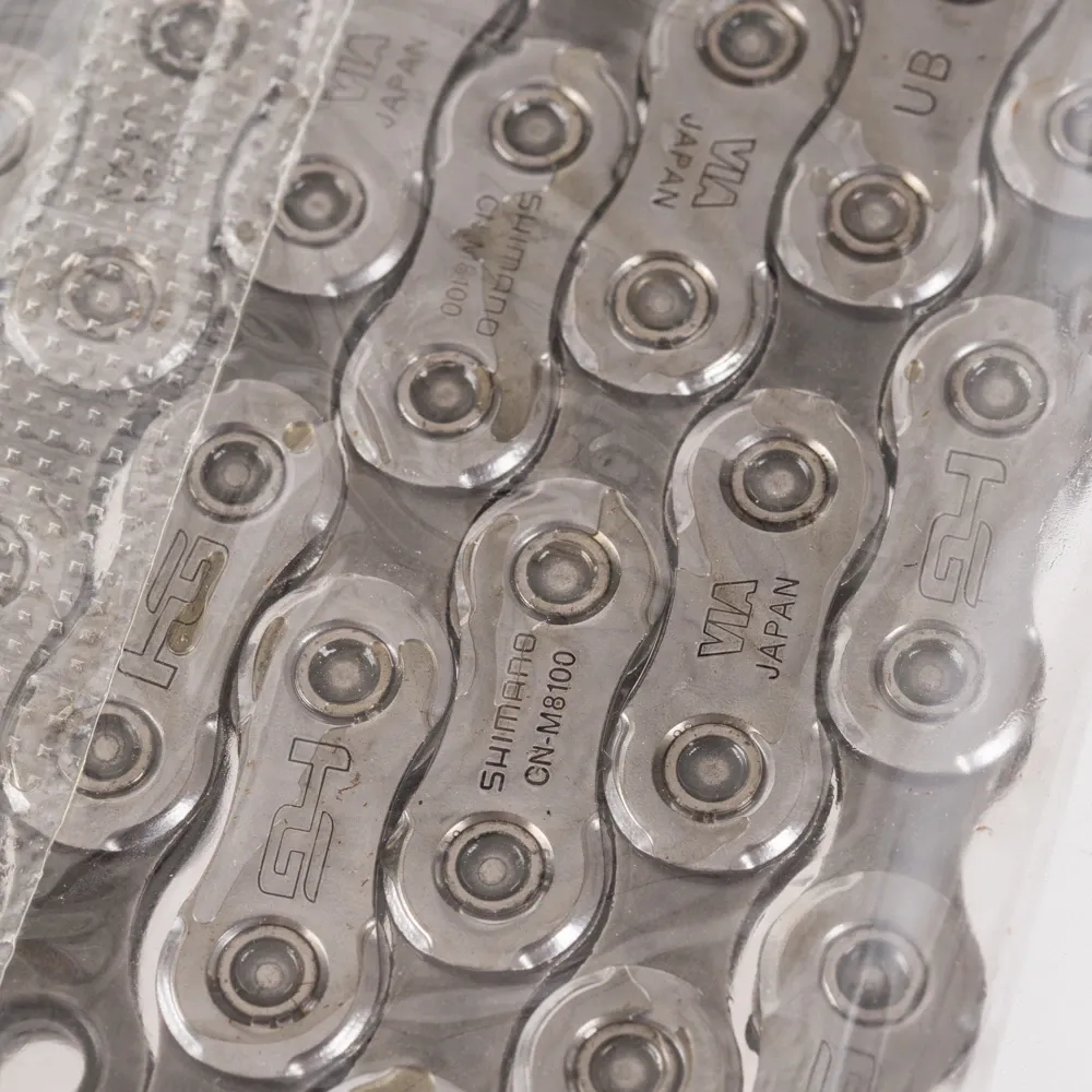 Цепь велосипедная Shimano CN-M8100 (12скоростей,118 звеньев)